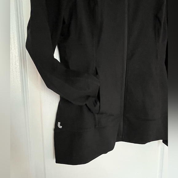 Lolë zip up light jacket with pockets - Picture 1 of 3